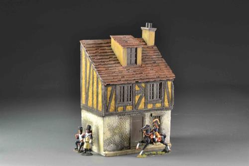 Yellow medieval house on 3 floors