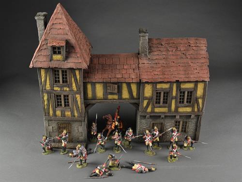 Half-timbered house or medieval house with passage and tower building.