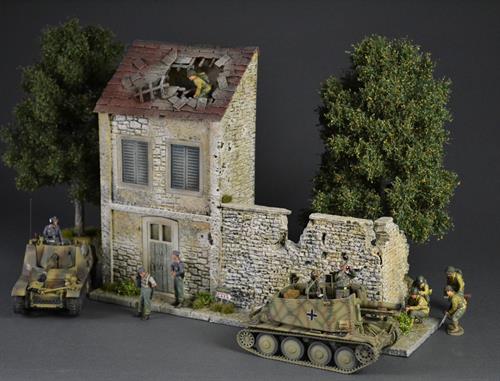 French country house and stone wall